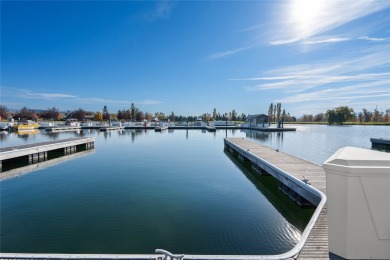 35' boat slip w/ a SeaRay Sundancer 320 in the coveted Eagle on Eagle Bend Golf Course in Montana - for sale on GolfHomes.com, golf home, golf lot