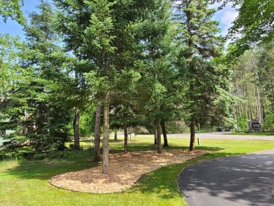 In Beautiful Michaywe find this well maintained 3BR 3BTH on Michaywe Pines Course in Michigan - for sale on GolfHomes.com, golf home, golf lot