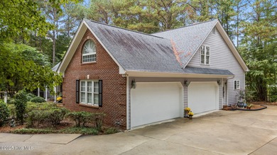 Situated on a corner lot and nestled on 1.29 wooded acres in the on The Neuse Golf Club in North Carolina - for sale on GolfHomes.com, golf home, golf lot