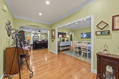 Situated on a corner lot and nestled on 1.29 wooded acres in the on The Neuse Golf Club in North Carolina - for sale on GolfHomes.com, golf home, golf lot