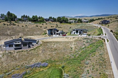 Nestled along Crane Creek golf course (private membership), this on Crane Creek Country Club in Idaho - for sale on GolfHomes.com, golf home, golf lot