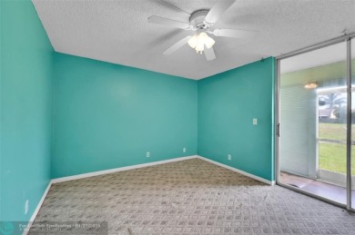 55+ COMMUNITY, THIS TURN KEY READY UNIT IS ON THE 1st FLOOR on Sunrise Lakes Phase III in Florida - for sale on GolfHomes.com, golf home, golf lot