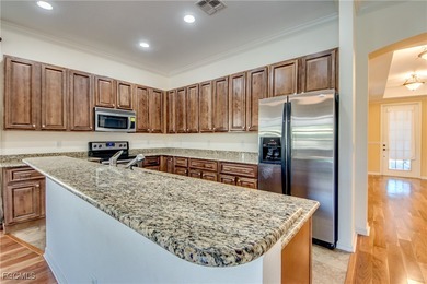 Welcome to your dream home in sunny Florida! Nestled in the on Copperhead Golf Club in Florida - for sale on GolfHomes.com, golf home, golf lot