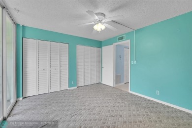 55+ COMMUNITY, THIS TURN KEY READY UNIT IS ON THE 1st FLOOR on Sunrise Lakes Phase III in Florida - for sale on GolfHomes.com, golf home, golf lot