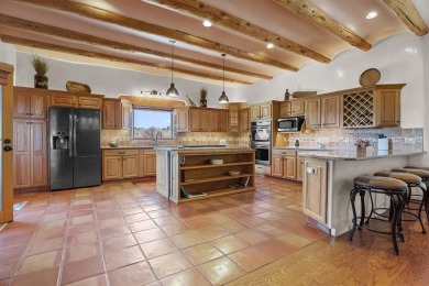 Adobe Dreams  Mountain Scenes!  Ready to fall in love with the on Taos Country Club in New Mexico - for sale on GolfHomes.com, golf home, golf lot