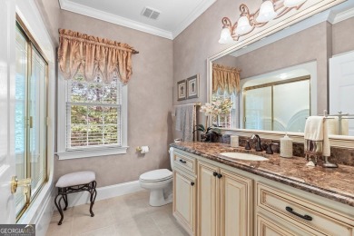 FIRST TIME ON THE MARKET! This exquisite 4-side blush brick on Royal Lakes Golf and Country Club in Georgia - for sale on GolfHomes.com, golf home, golf lot
