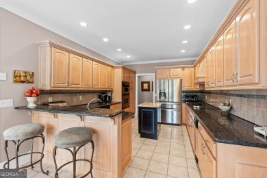 FIRST TIME ON THE MARKET! This exquisite 4-side blush brick on Royal Lakes Golf and Country Club in Georgia - for sale on GolfHomes.com, golf home, golf lot