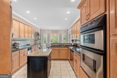 FIRST TIME ON THE MARKET! This exquisite 4-side blush brick on Royal Lakes Golf and Country Club in Georgia - for sale on GolfHomes.com, golf home, golf lot