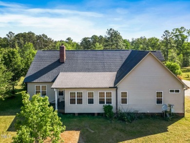 Welcome to your own 3-bedroom, 2-bath country retreat, perfectly on Carolina Lakes Country Club in North Carolina - for sale on GolfHomes.com, golf home, golf lot
