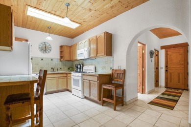 Adobe Dreams  Mountain Scenes!  Ready to fall in love with the on Taos Country Club in New Mexico - for sale on GolfHomes.com, golf home, golf lot