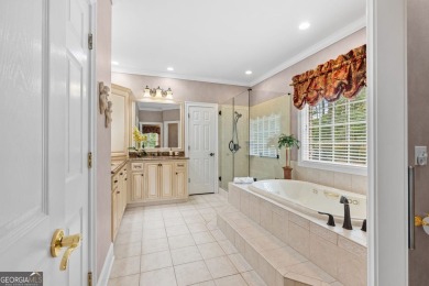 FIRST TIME ON THE MARKET! This exquisite 4-side blush brick on Royal Lakes Golf and Country Club in Georgia - for sale on GolfHomes.com, golf home, golf lot