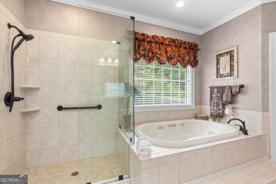 FIRST TIME ON THE MARKET! This exquisite 4-side blush brick on Royal Lakes Golf and Country Club in Georgia - for sale on GolfHomes.com, golf home, golf lot