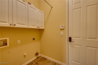 Welcome to your dream home in sunny Florida! Nestled in the on Copperhead Golf Club in Florida - for sale on GolfHomes.com, golf home, golf lot