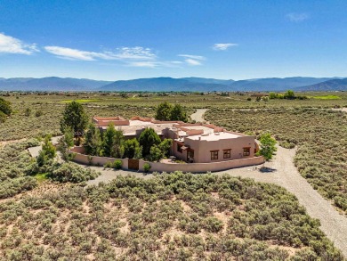 Adobe Dreams  Mountain Scenes!  Ready to fall in love with the on Taos Country Club in New Mexico - for sale on GolfHomes.com, golf home, golf lot