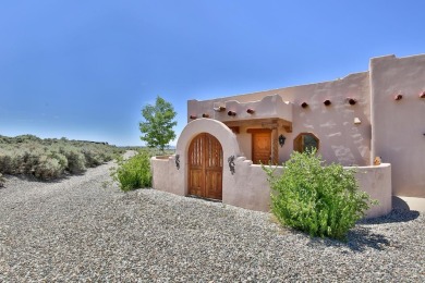 Adobe Dreams  Mountain Scenes!  Ready to fall in love with the on Taos Country Club in New Mexico - for sale on GolfHomes.com, golf home, golf lot