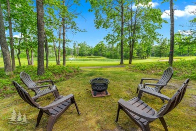 Nestled beside Hole 10 of Garland's scenic Fountains Course, 824 on Garland Resort and Golf Club  in Michigan - for sale on GolfHomes.com, golf home, golf lot