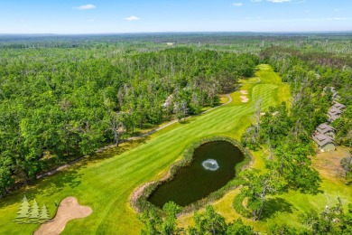 Nestled beside Hole 10 of Garland's scenic Fountains Course, 824 on Garland Resort and Golf Club  in Michigan - for sale on GolfHomes.com, golf home, golf lot