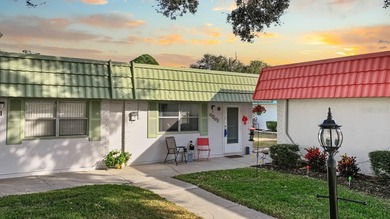 Set on a quiet dead-end street with a lush treelined green space on Sandpiper Golf Club in Florida - for sale on GolfHomes.com, golf home, golf lot