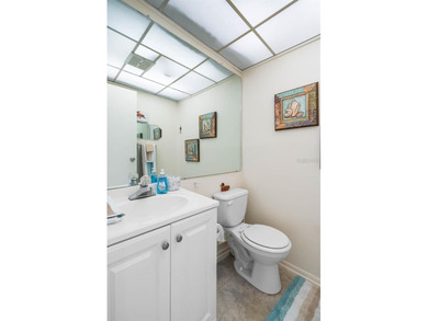 Set on a quiet dead-end street with a lush treelined green space on Sandpiper Golf Club in Florida - for sale on GolfHomes.com, golf home, golf lot