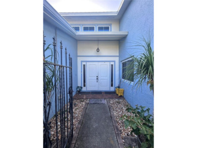 Stunning home in the sought-after Wingfoot neighborhood on Suntree Country Club in Florida - for sale on GolfHomes.com, golf home, golf lot