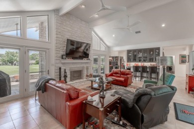 Exquisite and stylishly updated golf course home with enclosed on Slick Rock Golf Course - Horseshoe Bay in Texas - for sale on GolfHomes.com, golf home, golf lot