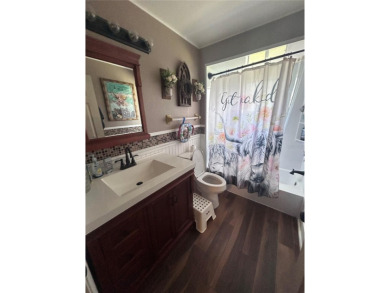 Stunning home in the sought-after Wingfoot neighborhood on Suntree Country Club in Florida - for sale on GolfHomes.com, golf home, golf lot