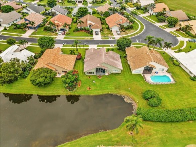 Beautiful large home in sought after Pipers Glen Estates. Part on Westchester Golf and Country Club in Florida - for sale on GolfHomes.com, golf home, golf lot