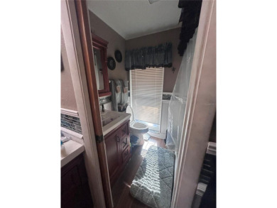 Stunning home in the sought-after Wingfoot neighborhood on Suntree Country Club in Florida - for sale on GolfHomes.com, golf home, golf lot