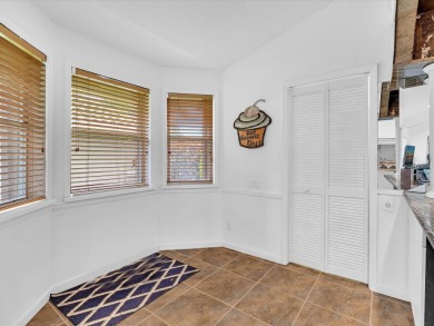 Beautiful large home in sought after Pipers Glen Estates. Part on Westchester Golf and Country Club in Florida - for sale on GolfHomes.com, golf home, golf lot