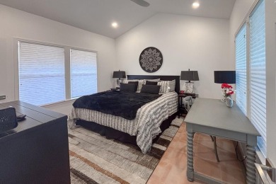 Exquisite and stylishly updated golf course home with enclosed on Slick Rock Golf Course - Horseshoe Bay in Texas - for sale on GolfHomes.com, golf home, golf lot