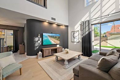 Exquisitely transformed residence in the Spanish-inspired on PGA National Golf Club in Florida - for sale on GolfHomes.com, golf home, golf lot