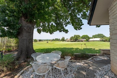 Exquisite and stylishly updated golf course home with enclosed on Slick Rock Golf Course - Horseshoe Bay in Texas - for sale on GolfHomes.com, golf home, golf lot