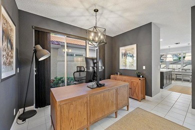 Exquisitely transformed residence in the Spanish-inspired on PGA National Golf Club in Florida - for sale on GolfHomes.com, golf home, golf lot