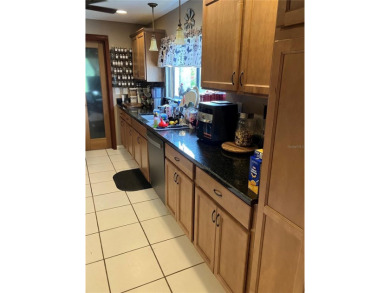 Stunning home in the sought-after Wingfoot neighborhood on Suntree Country Club in Florida - for sale on GolfHomes.com, golf home, golf lot