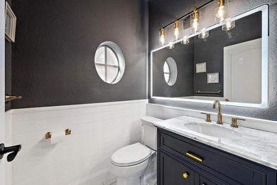 Exquisitely transformed residence in the Spanish-inspired on PGA National Golf Club in Florida - for sale on GolfHomes.com, golf home, golf lot