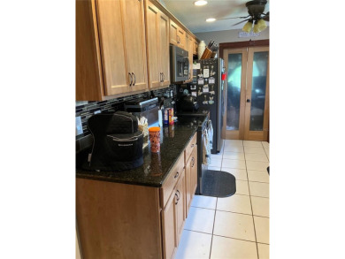 Stunning home in the sought-after Wingfoot neighborhood on Suntree Country Club in Florida - for sale on GolfHomes.com, golf home, golf lot