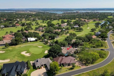 Exquisite and stylishly updated golf course home with enclosed on Slick Rock Golf Course - Horseshoe Bay in Texas - for sale on GolfHomes.com, golf home, golf lot
