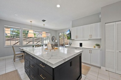 Exquisitely transformed residence in the Spanish-inspired on PGA National Golf Club in Florida - for sale on GolfHomes.com, golf home, golf lot