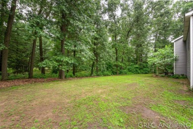 Welcome to 309 Woodview, a beautifully reimagined 4-bedroom on Eagle Island Golf Club in Michigan - for sale on GolfHomes.com, golf home, golf lot