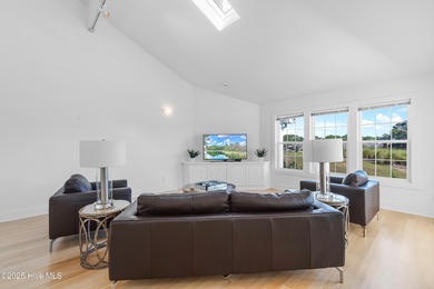 This townhome offers a spectacular water and golf view and is on Members Club At St. James Plantation in North Carolina - for sale on GolfHomes.com, golf home, golf lot