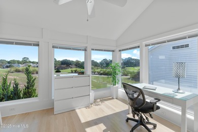 This townhome offers a spectacular water and golf view and is on Members Club At St. James Plantation in North Carolina - for sale on GolfHomes.com, golf home, golf lot