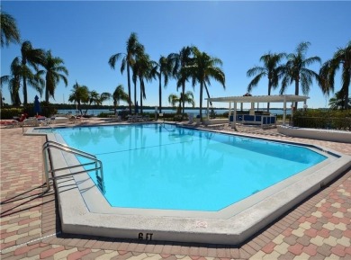 NON FLOODED 1st FLOOR WATERFRONT VILLA IN ISLA DEL SOL*** This on Isla Del Sol Yacht and Country Club in Florida - for sale on GolfHomes.com, golf home, golf lot