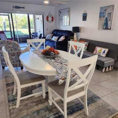 NON FLOODED 1st FLOOR WATERFRONT VILLA IN ISLA DEL SOL*** This on Isla Del Sol Yacht and Country Club in Florida - for sale on GolfHomes.com, golf home, golf lot