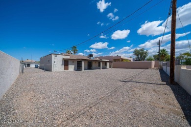 VERY clean 2-bedroom, 2-bathroom home with a versatile den! This on London Bridge Golf Course in Arizona - for sale on GolfHomes.com, golf home, golf lot