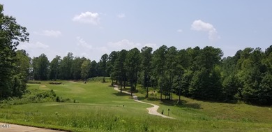 Build your dream home on this corner lot in the desirable Chapel on Chapel Ridge Golf Club in North Carolina - for sale on GolfHomes.com, golf home, golf lot