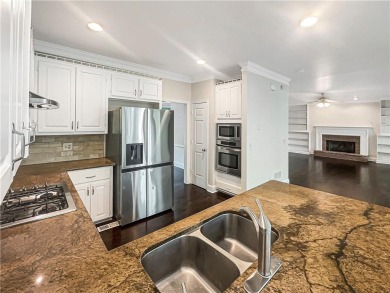 Welcome to this stunning 4-bedroom, 3.5-bath Woodstock home that on Canongate At Eagle Watch Golf Club in Georgia - for sale on GolfHomes.com, golf home, golf lot
