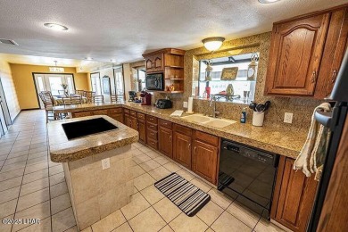 What? You actually live in a castle? Welcome home to Castlewood on London Bridge Golf Course in Arizona - for sale on GolfHomes.com, golf home, golf lot