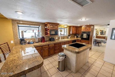What? You actually live in a castle? Welcome home to Castlewood on London Bridge Golf Course in Arizona - for sale on GolfHomes.com, golf home, golf lot