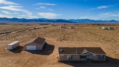 Set on 5 acres in Mountain Vista Ranches, this AR/5A-zoned ranch on Valle Vista Golf Course in Arizona - for sale on GolfHomes.com, golf home, golf lot