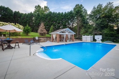 This beautifully updated home is perfectly designed for modern on Catawba Springs Golf Course At Lake Hickory  in North Carolina - for sale on GolfHomes.com, golf home, golf lot
